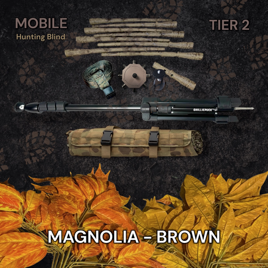GHILLIEPUCK Tier 2 PVC Mobile kit in Magnolia Brown Gold — product mounted on a tree